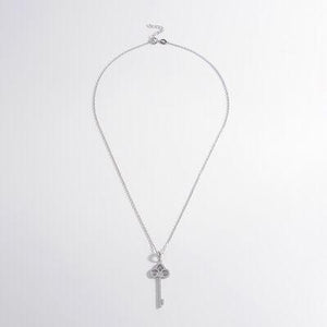 a silver necklace with a cross on it