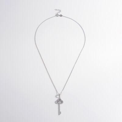 a silver necklace with a cross on it