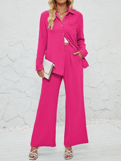 a woman in a pink shirt and wide legged pants