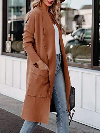 a woman wearing a brown coat and jeans