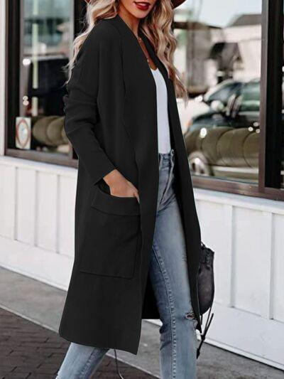 a woman wearing a black coat and jeans