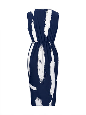 a blue and white dress with white paint on it