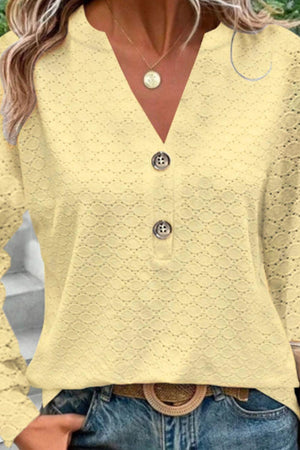 a woman wearing a yellow shirt and jeans