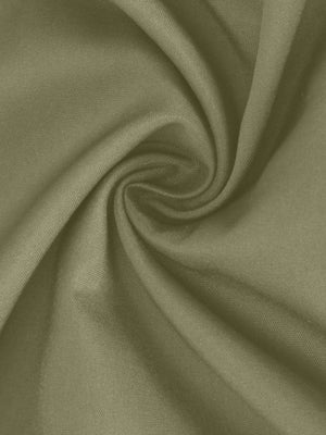 a close up view of a green fabric