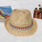a straw hat sitting next to a magazine