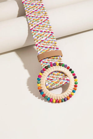 a bracelet with beads on a white surface
