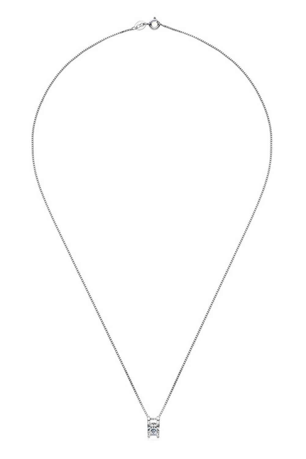 a necklace with a diamond pendant on a white background