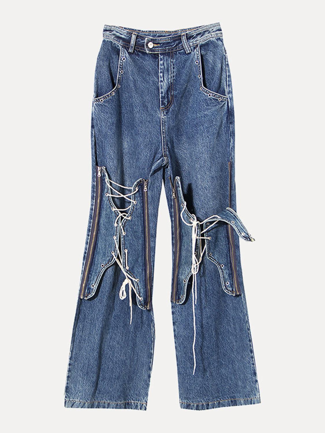 a pair of blue jeans with laces on them