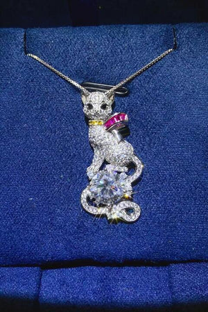 a necklace with a cat on top of it