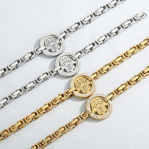 a group of four gold and silver bracelets