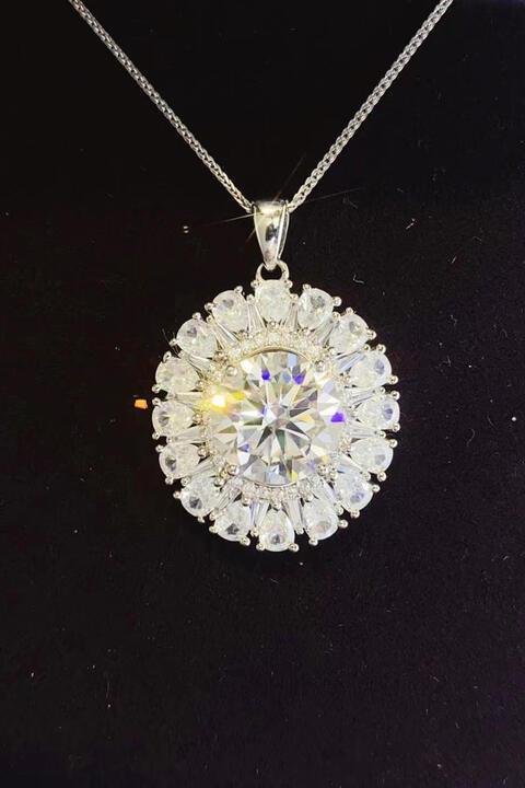 a necklace with a large diamond in the center