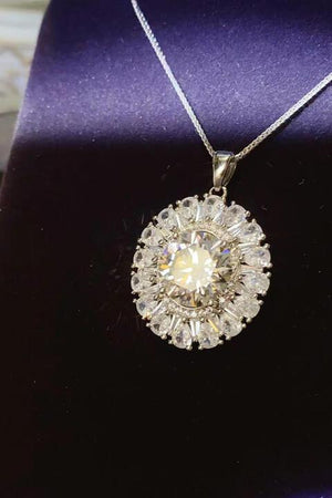 a necklace with a large diamond in the center