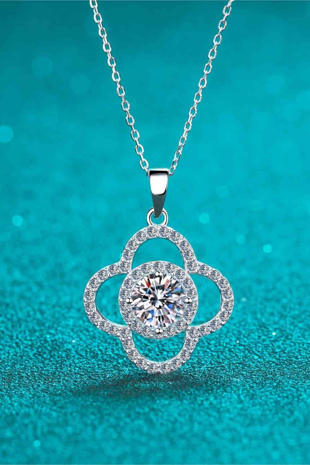 a diamond pendant on a blue background
