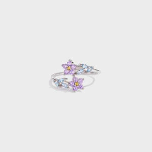 a ring with three flowers on it