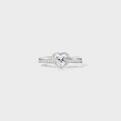 a heart shaped diamond ring on a white background