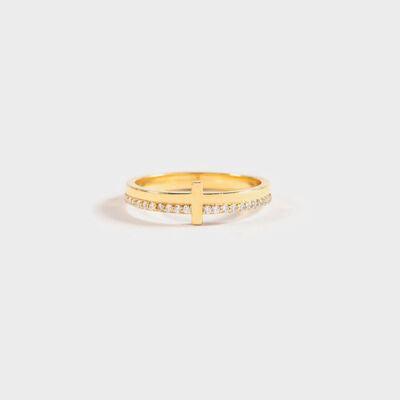 a gold ring with a cross on it