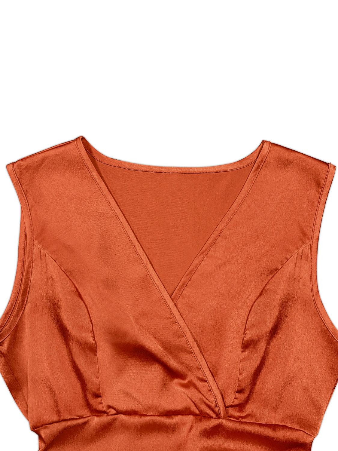 an orange top with a knot on the front