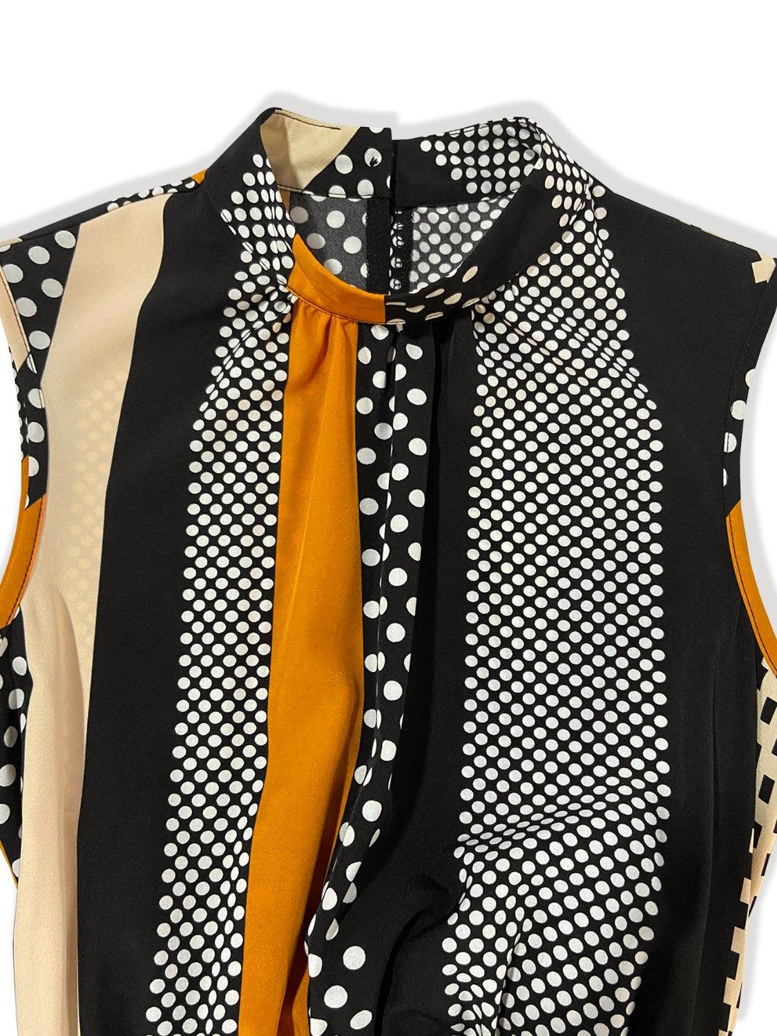 a black and white shirt with a yellow tie
