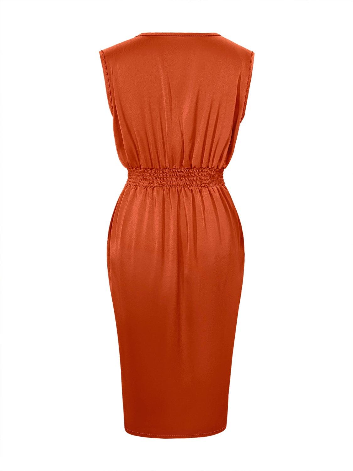 a woman in an orange dress with a belt