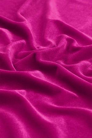 a close up view of a pink fabric