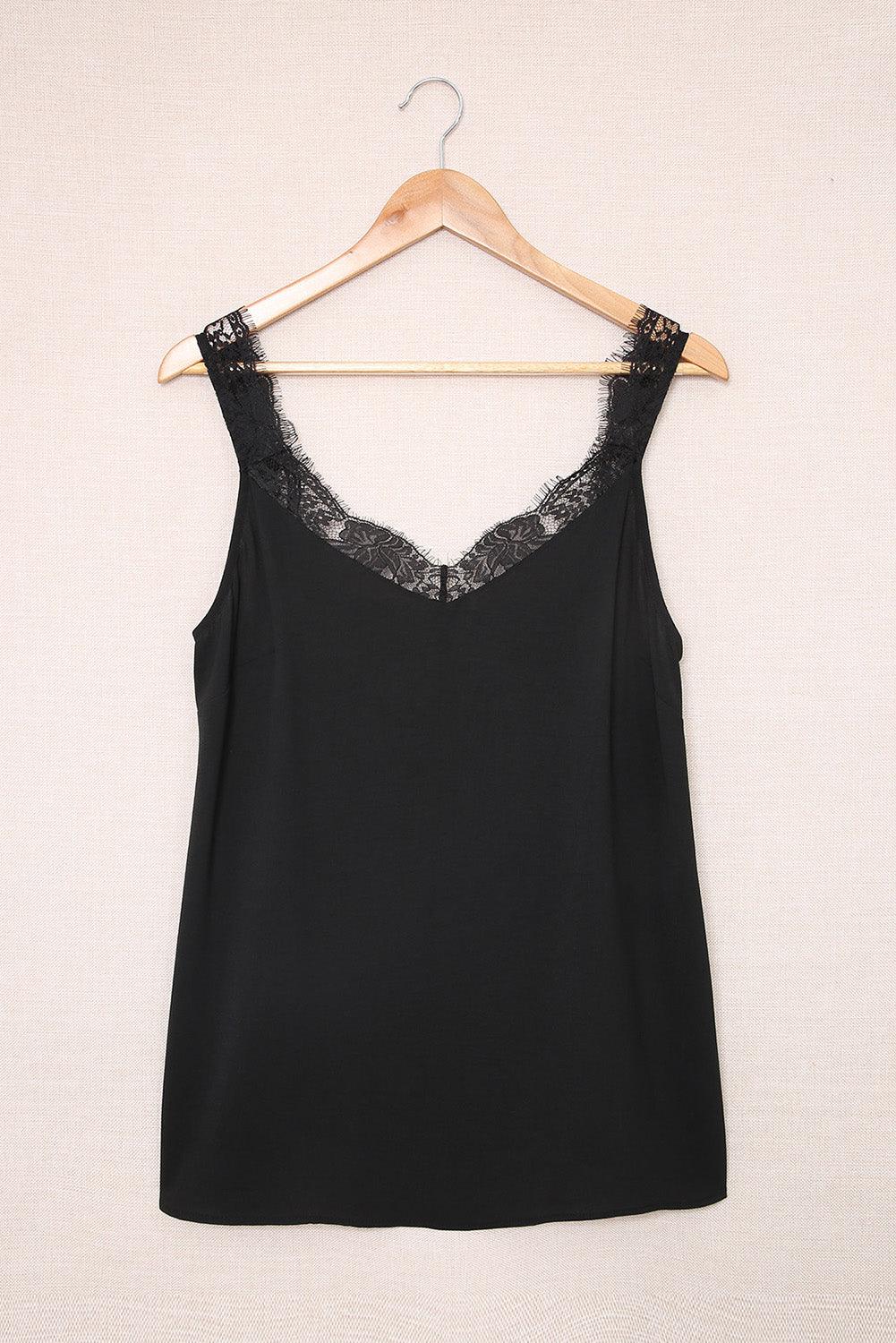 a women's black top with lace on it